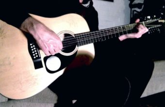 Social Gratification on the 12 string with iMovie audio effects by Ylia Callan Guitar