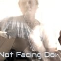 Not Facing Down 12 String Acoustic Guitar Music Video Thumbnail by Guitarist Ylia Callan